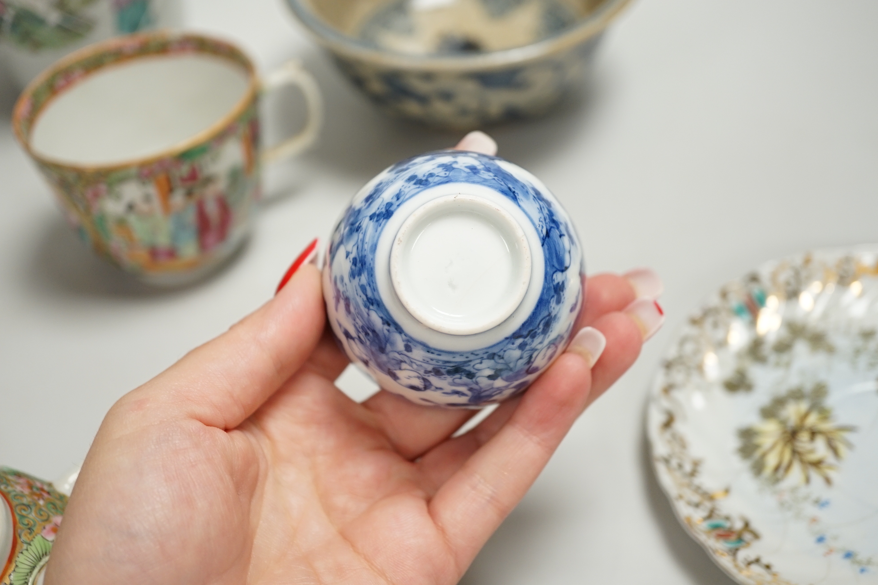 Chinese and Japanese ceramics including Canton cups and blue and white tea bowl, the largest 25cm high